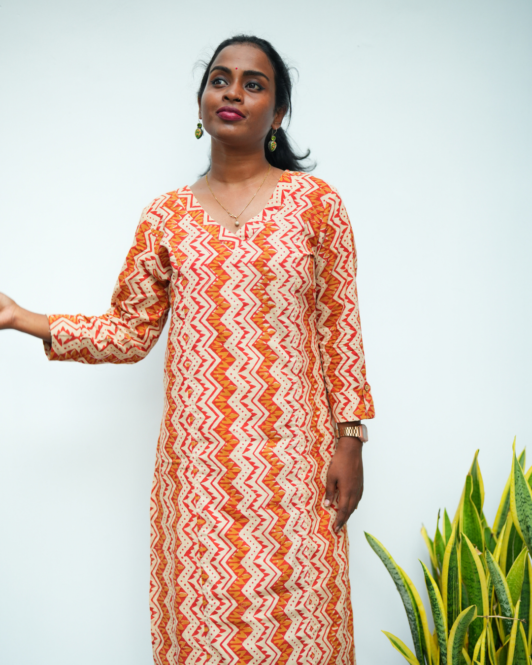 Brick red and beige hand block Printed Prinsess cut Cross V Neck Kurti