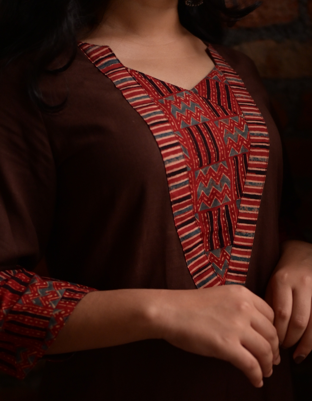 "TARA"BROWN BASE AND PINK AJRAKH PRINTED PATCH KURTI
