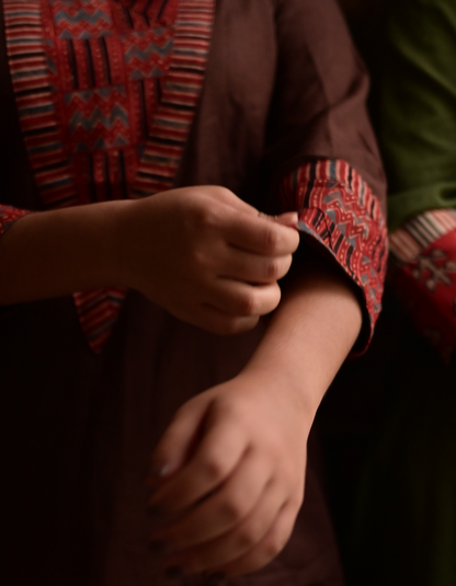 "TARA"BROWN BASE AND PINK AJRAKH PRINTED PATCH KURTI